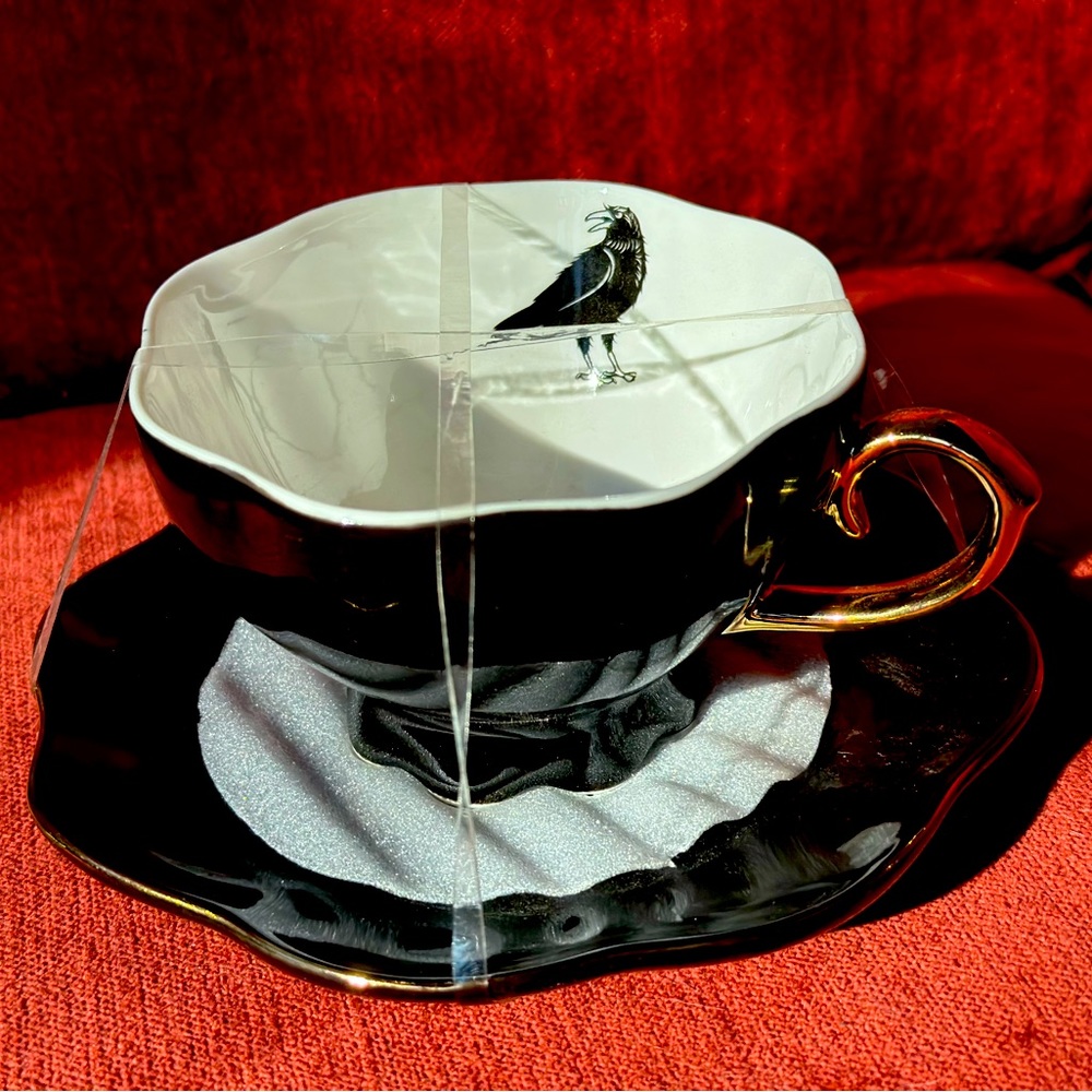 New Raven teacup gold handle
